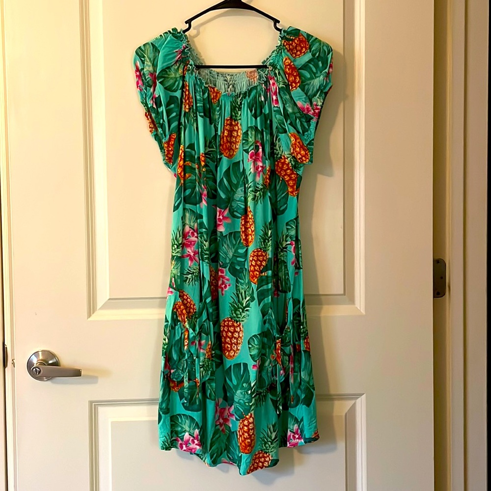 Pineapple dress. On or off the shoulder. Has pockets.